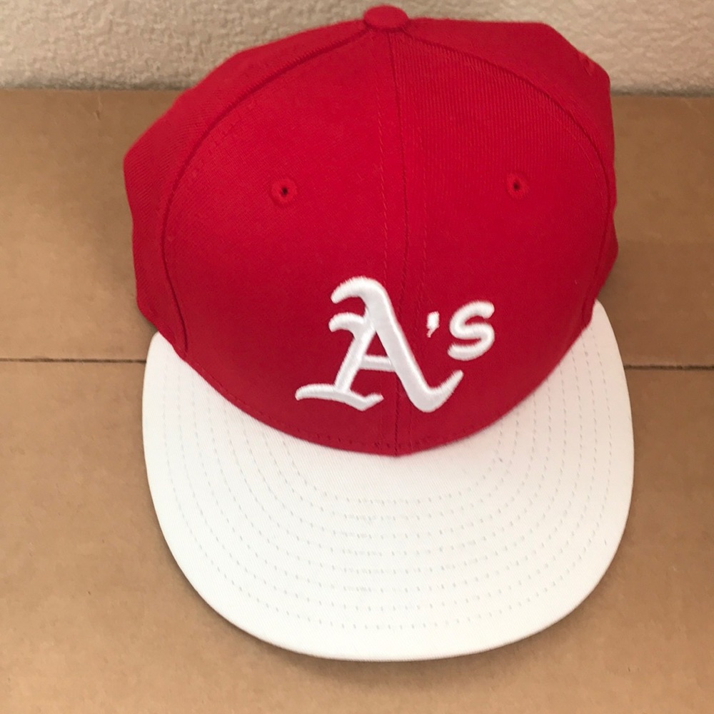 A’s hat red and white